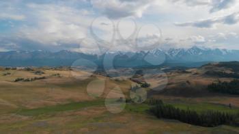 Aerial video of the Kurai steppe and the North Chuia Ranges in the south-eastern Altai, Siberia, Russia
