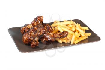 Fried chicken leg with french fries on white background