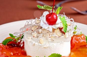 tasty fruit dessert with cherry