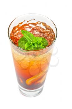 cold tea with ripe ginger, lemon, mint and ice on white