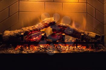Closeup of fireplace at dark room