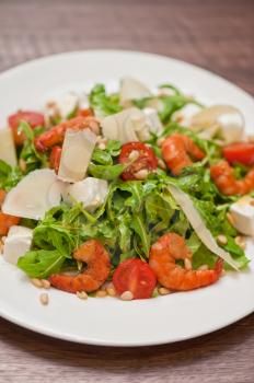 shrimp salad with cheese and arugula