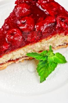 tasty cake with cherry and fresh mint