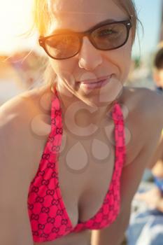 Woman at beach, close up still life portrait