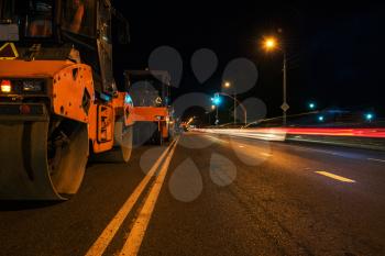 repairing the road in the night city