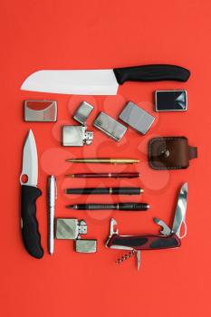 Male gifts on a orange background, flat lay