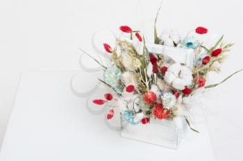 Beauty bouquet of dried flowers on a white
