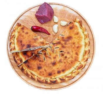 Meat ossetian pie on a white background
