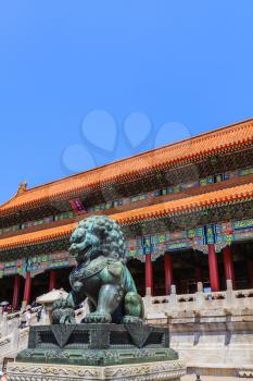 Beijing, China - April 29, 2015: Forbidden City, Beijing, China. The Gate of Supreme Harmony with guardian bronze lion