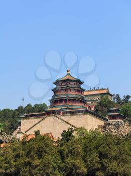 Beijing, China -May 2, 2015: The Summer Palace, Beijing, China. The Tower of Buddhist Incense with pavilions and stone staircase with visitors