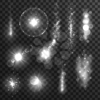 Sparkling silver light flashes. Glittering sparkles and star lights with lens flare effect on transparent background