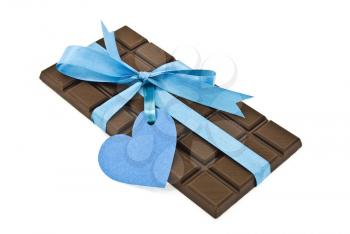 Black chocolate with blue ribbon and tag heart 