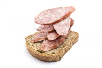 Royalty Free Photo of Sliced Sausage on Bread