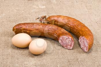 Royalty Free Photo of Smoked Sausage and Eggs