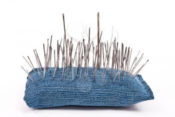 Royalty Free Photo of a Pincushion With Lot of Needles