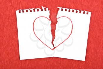 Royalty Free Photo of a Heart Drawn on a Torn Notebook Page