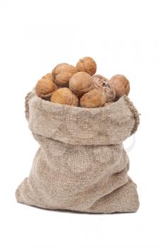 Royalty Free Photo of a Burlap Sack With Walnuts