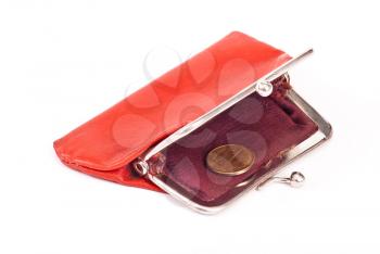 Old red purse against with coins 