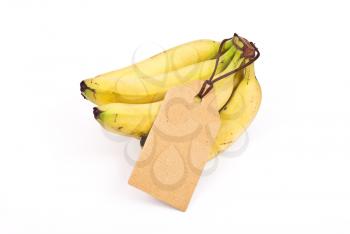 Royalty Free Photo of a Bunch of Bananas With a Tag