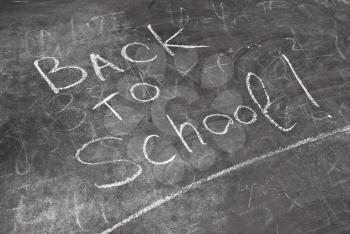 Royalty Free Photo of Back to School Written on Chalkboard