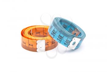 Curled measuring tapes 