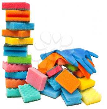 Royalty Free Photo of a Pair of Rubber Gloves and Stacks of Sponges