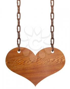 Wooden heart on the iron chains