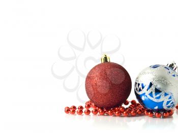 Christmas decoration - red and blue balls with beads over white