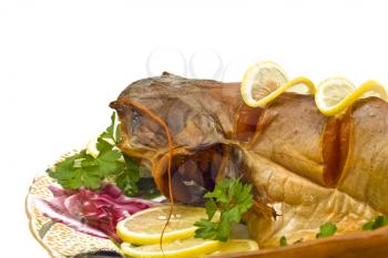 Shore dinner - fresh-water catfish (sheatfish) with lemon and parsley