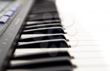 Extreme Closeup of piano keyboard of synthesizer (shallow DOF)