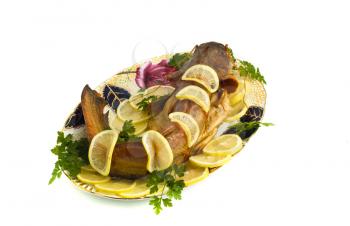 Food - bloated fresh-water catfish (sheatfish) with lemon and parsley