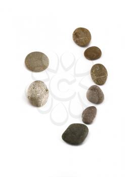 Positive funny emoticon assembled of pebble isolated over white