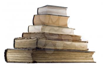 Pyramid pile of old books isolated over white background