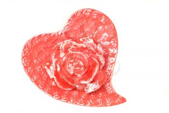 Red valentine heart with artificial rose isolated