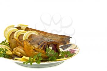 Shore dinner - bloated fresh-water catfish (sheatfish) with lemon and parsley