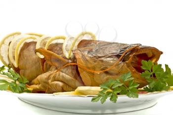 Shore dinner - tasty fresh-water catfish (sheatfish) with lemon and parsley
