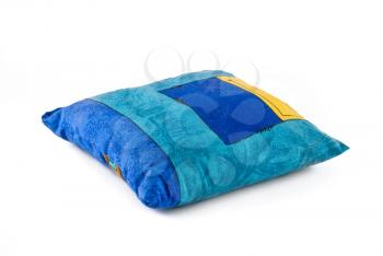 Small colorful pillow over white background 