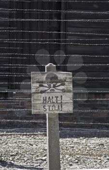 Caution sign board (DOF) in Auschwitz concentration camp, Poland