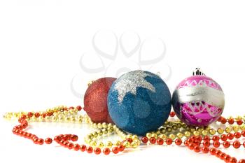 Christmas greeting - red, blue and pink balls over white