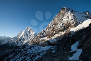 Cho La pass peaks at dawn in Himalaya mountains. Hiling in Nepal