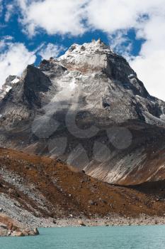 Mt. Summit and Sacred Lake near Gokyo in Himalayas. Pictured in Nepal