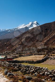 Himalaya landscape: snowed peaks and sherpa village.Travel to Nepal