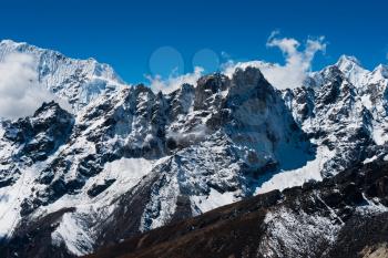 Mountain ridge scene viewed from Renjo pass in Himalayas. Trekking in Nepal