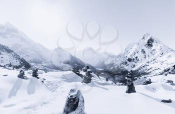 Cho La pass and snowed peaks at dawn in Himalaya. Travel to Nepal