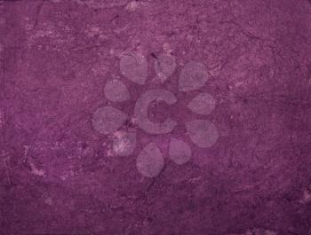 Purple aged handmade asian paper texture. Useful as background