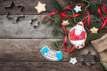 New Year 2015 and Xmas sheep cookie and pastry on wood in rustic style. Free space for text