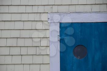 Royalty Free Photo of the Top Corner of a Blue Door