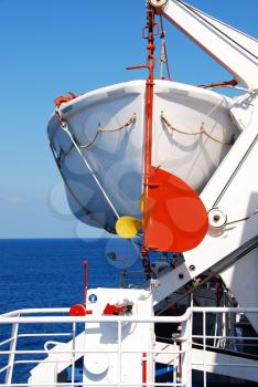 Royalty Free Photo of a Life Boat on a Ship in a Aegean Sea