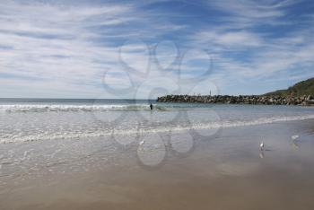 Royalty Free Photo of a Person in the Water at the Beach