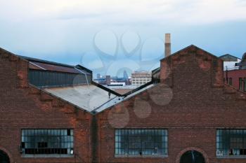 View of the roofs on abandoned commercial warehouses.